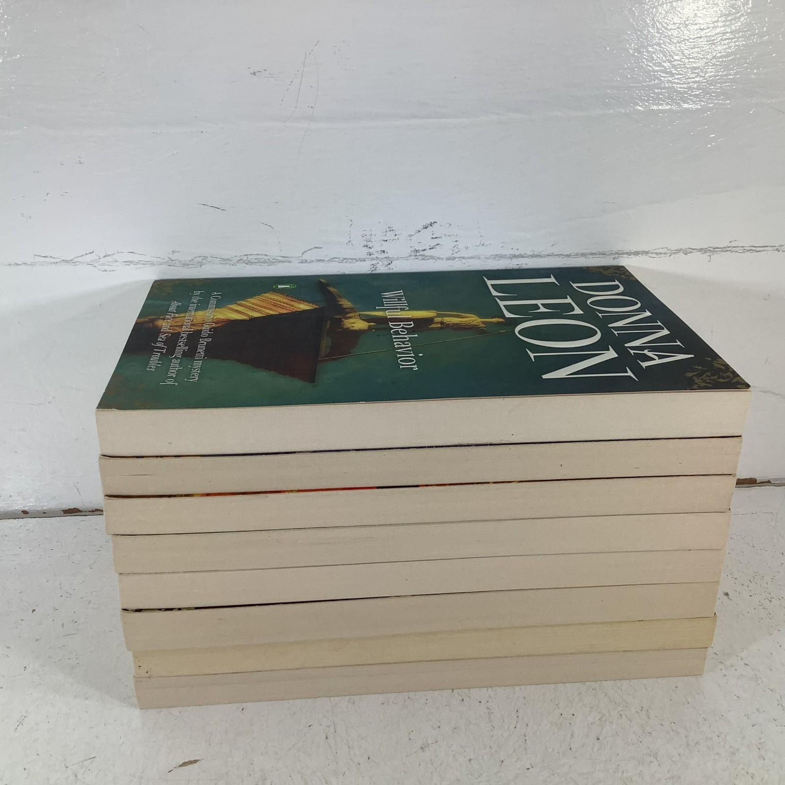 Donna Leon lot of 8 Commissario Guido Brunetti Mystery Series Trade PB Like New