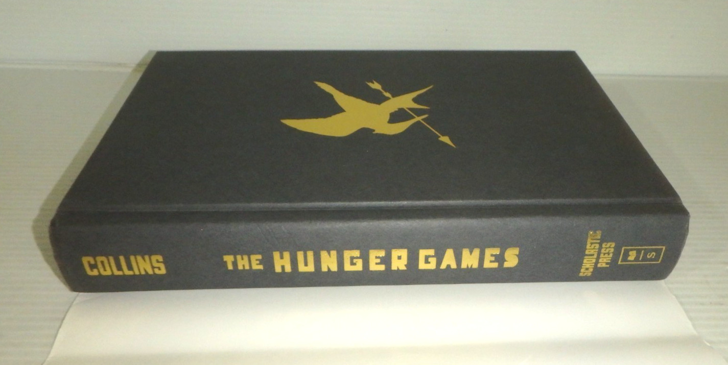 Hunger Games Trilogy + 1 Suzanne Collins & 1000 pc Puzzle (LN) HB w/DJ – 1st