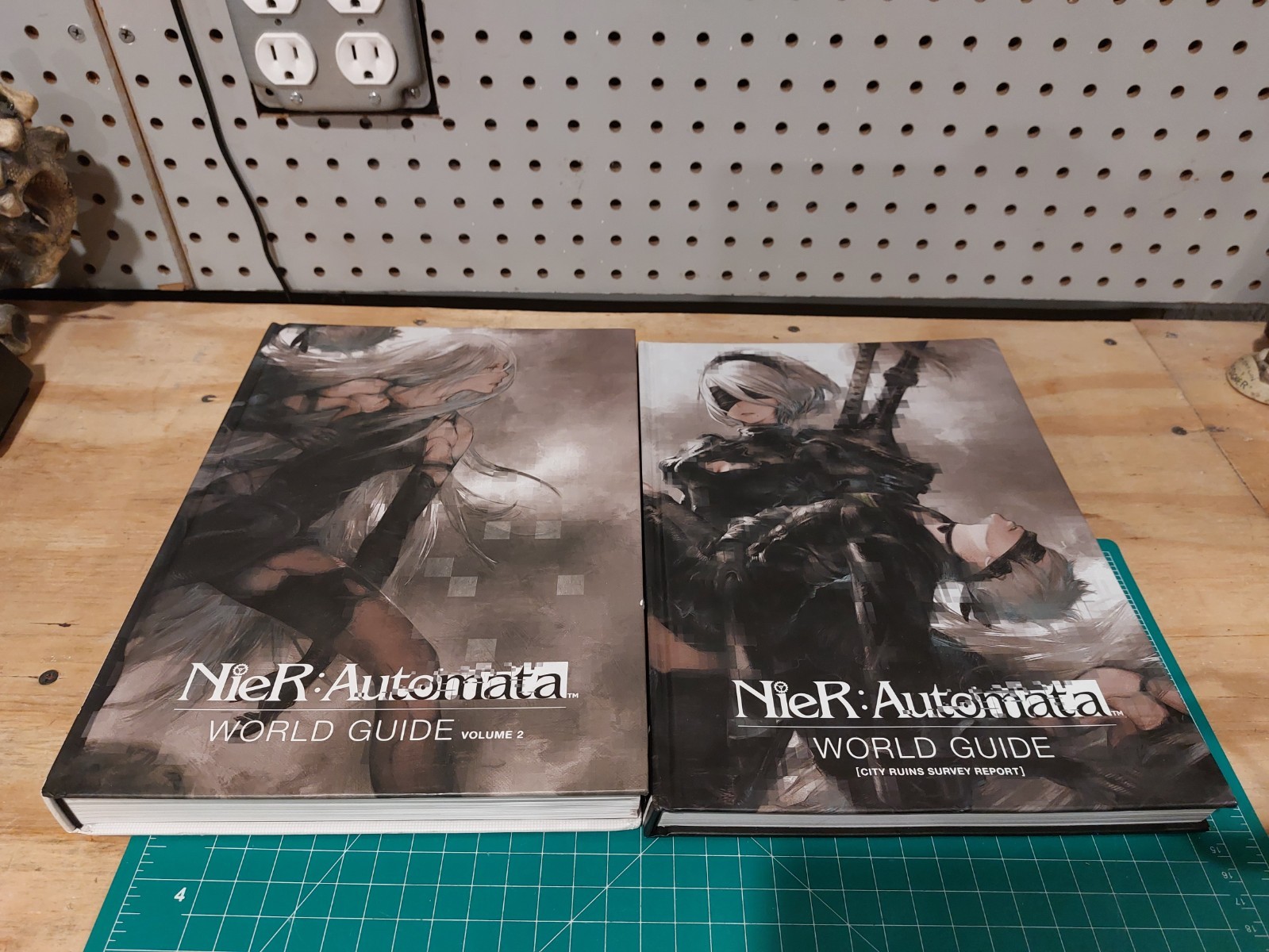 NIER: AUTOMATA WORLD GUIDE VOLUME 1 + 2 By Square Enix – Hardcover Lot