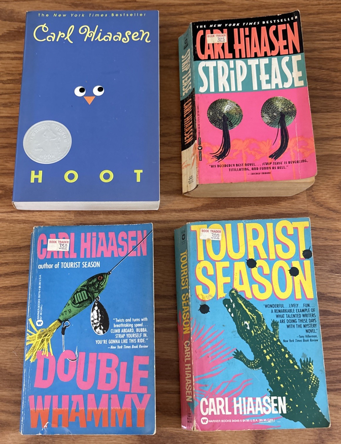 Set of 4 Paperbacks by Carl Hiaasen – Tourist Season, Hoot, Strip Tease, Double