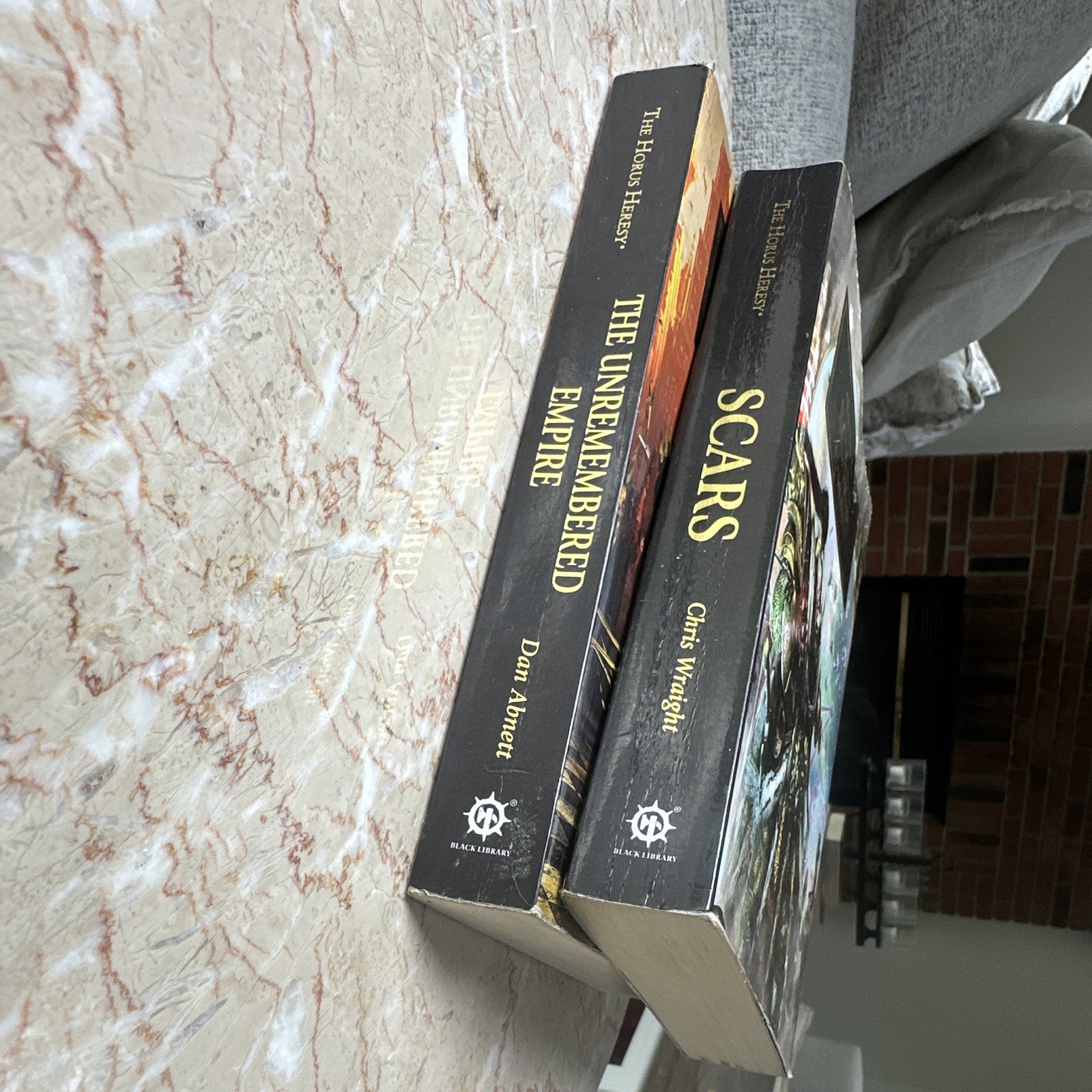 2 Books- The Unremembered Empire (Dan Abnett) and Scars (Chris Wraight)