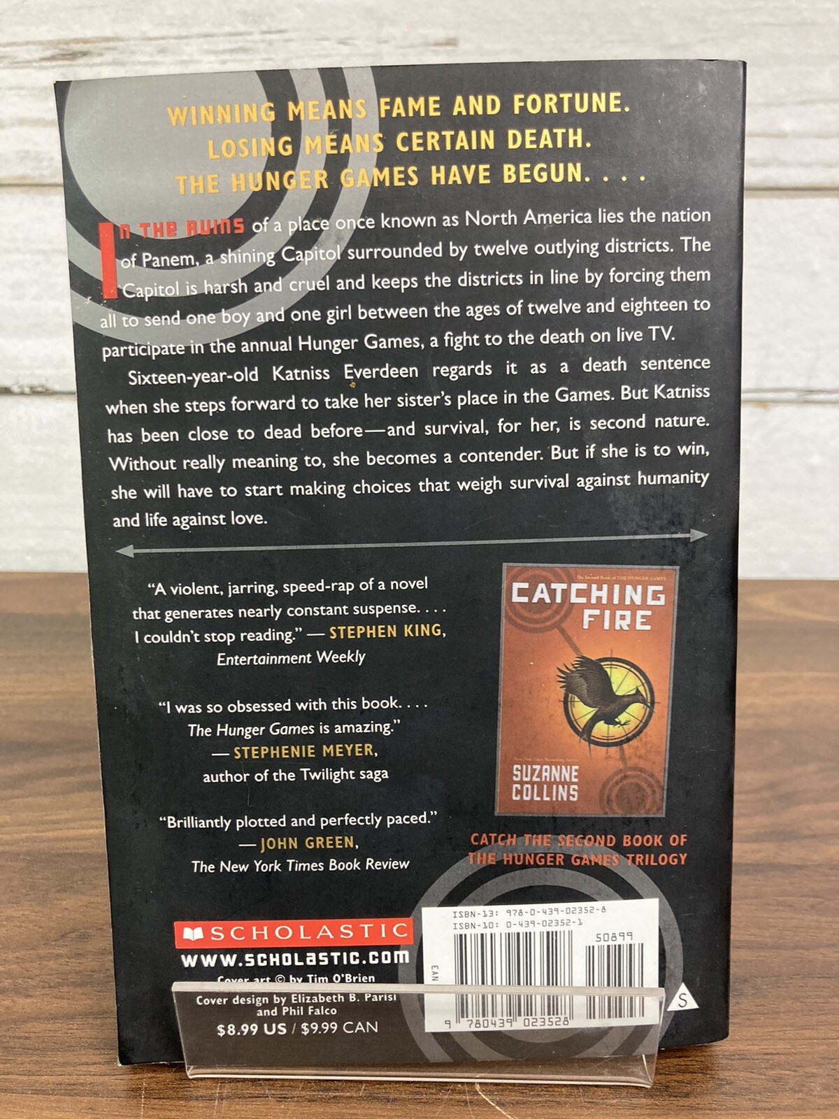 The Hunger Games Book Paperback By Suzanne Collins 1st Scholastic Edition 2009