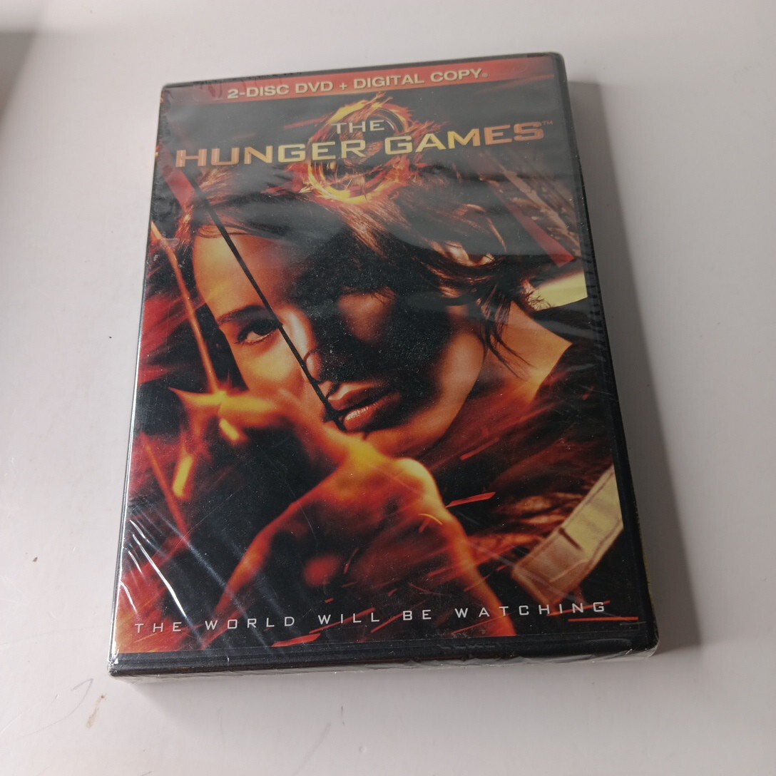 The Hunger Games (Book 1) + Guide To The Hunger Games + DVD