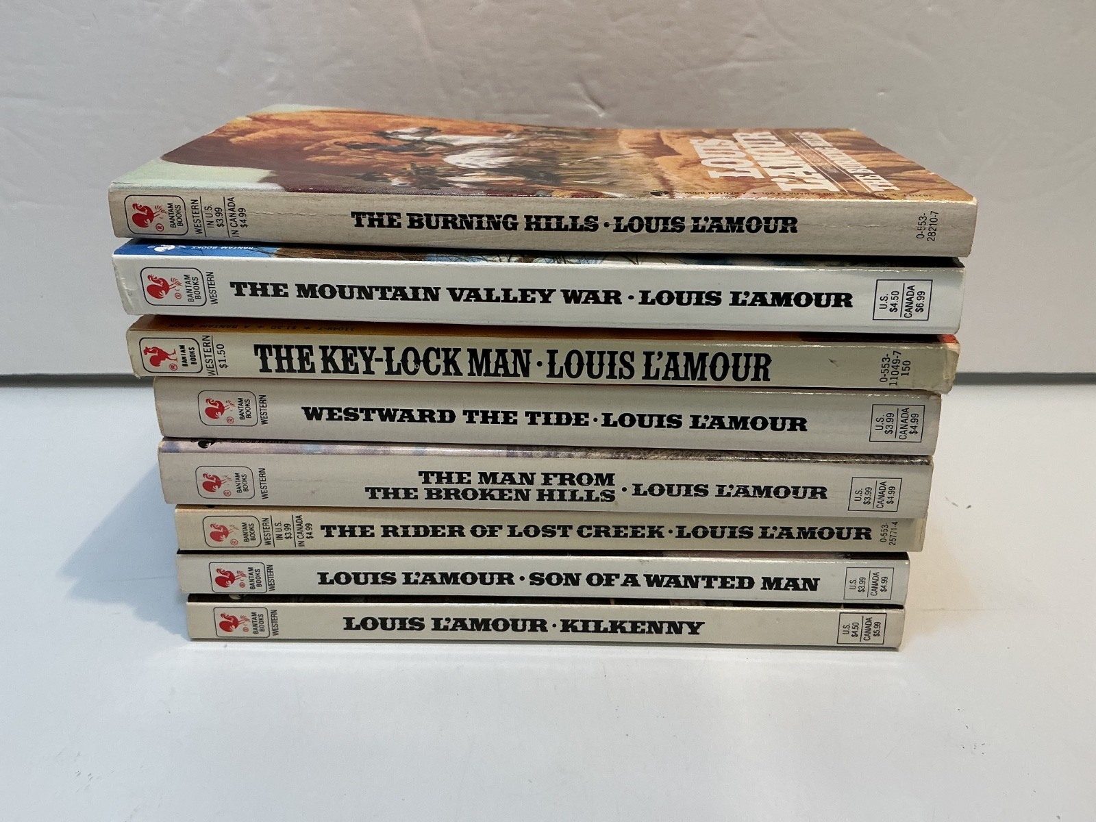 Lot of 8 Louis L’Amour Vintage Novels (PPBK)