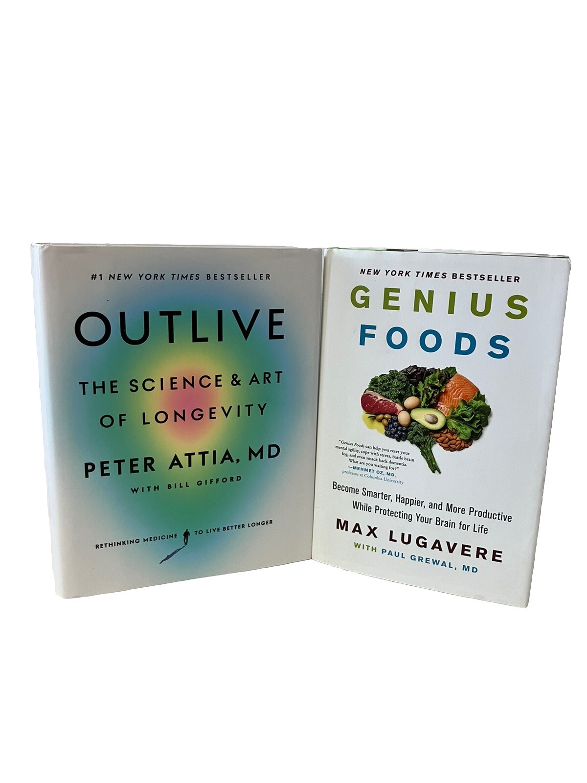 Outlive by Peter Attia 2023 HC & Genius Foods by Max Lugavere 2018 HC VERY GOOD