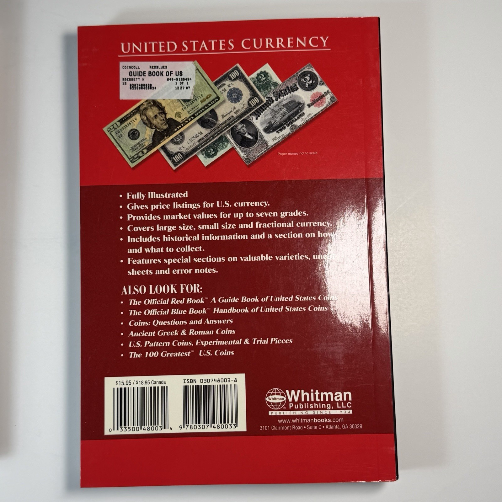 2 paperback books on coins and currency 2006 2009 Whitman Krause Publications