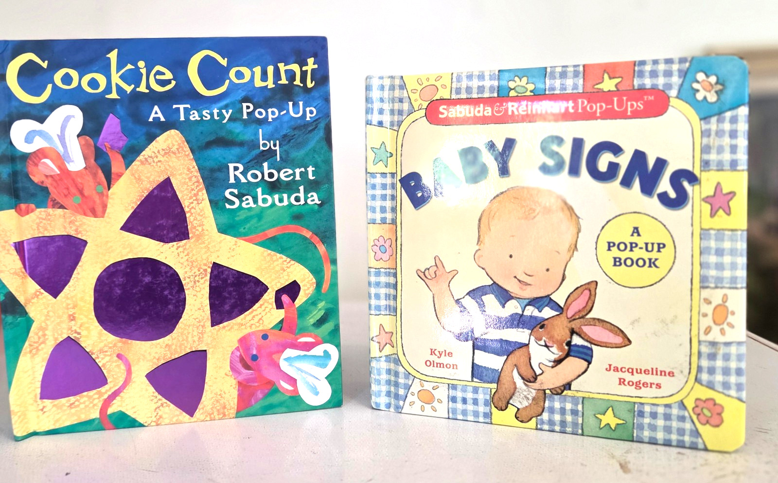 2 Pop-Up Books_ROBERT SABUDA Baby Signs 7×7″_Cookie Count 7″x8″_both like new