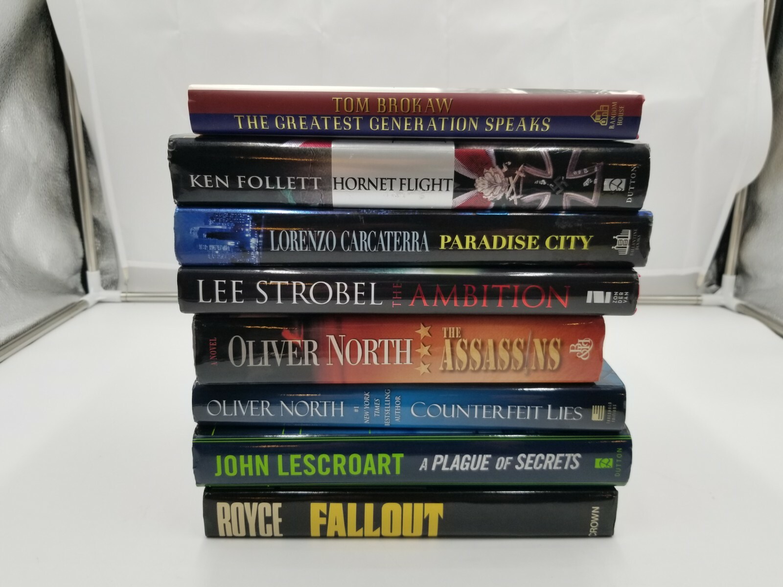 Lot of 8 Books Oliver North Ken Follet & more. See pictures