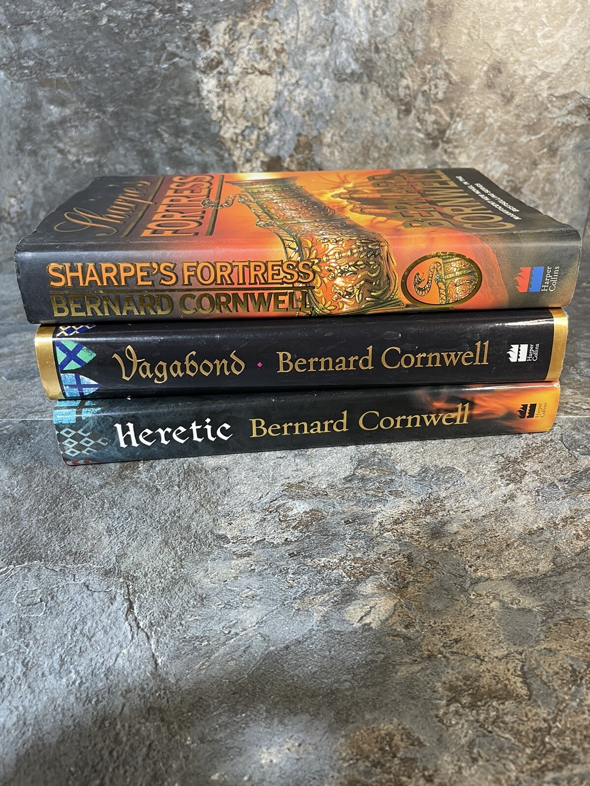 3 Bernard Cornwell Hardback Books – Heretic, Vagabond, Sharpe’s Fortress