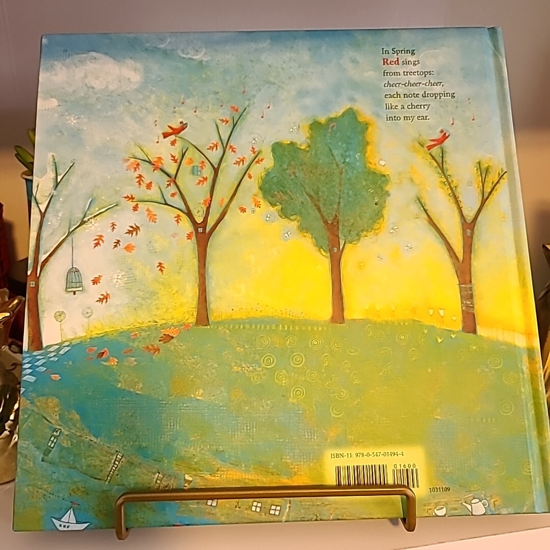 Red Sings from Treetops: A Caldecott Honor Award Winner by Joyce Sidman (2009)