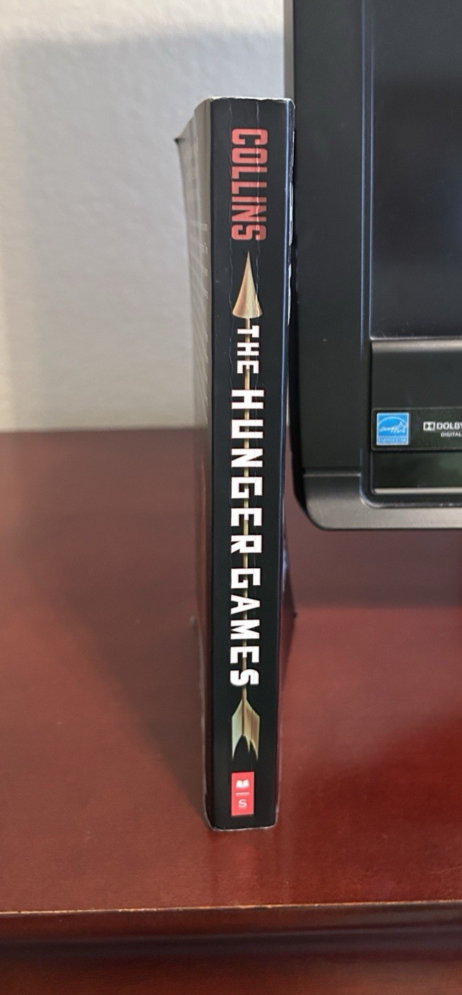 The Hunger Games (Book 1) – Suzanne Collins – Paperback – 2010