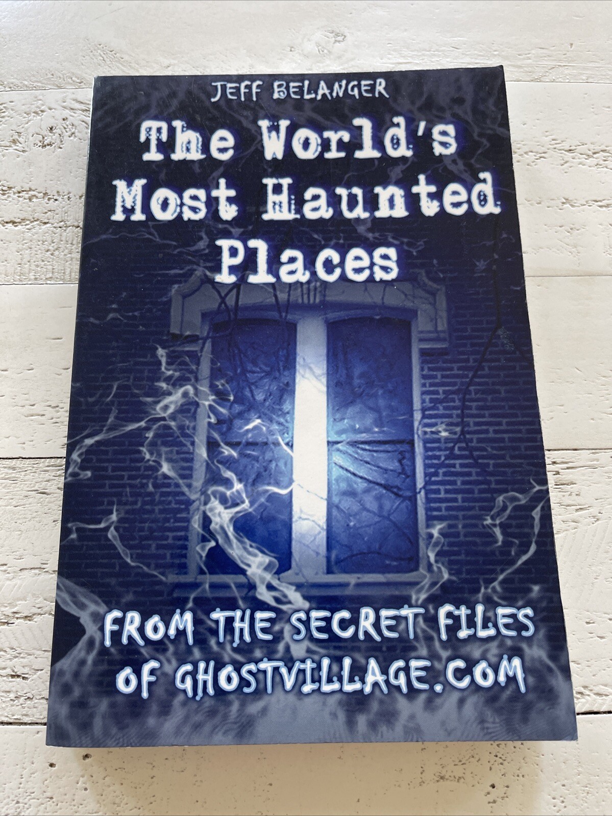 The World’s Most Haunted Places by Jeff Belanger; First Edition (2004), SIGNED