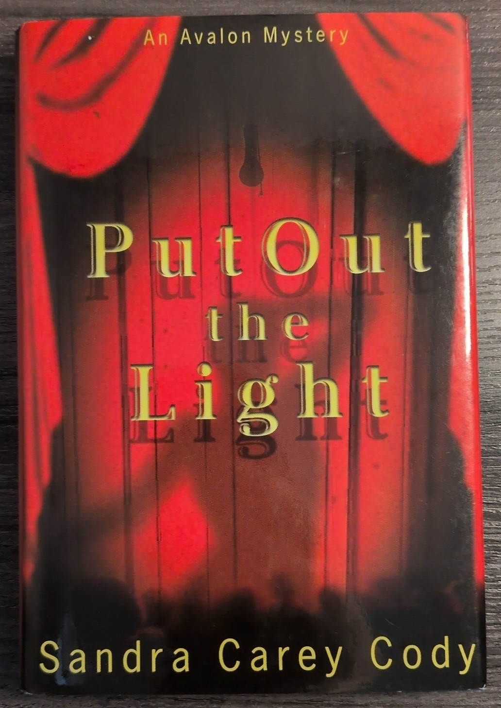 An Avalon Myuster 2 book bundle: Put Out the Light & Left At Oz – Signed HC