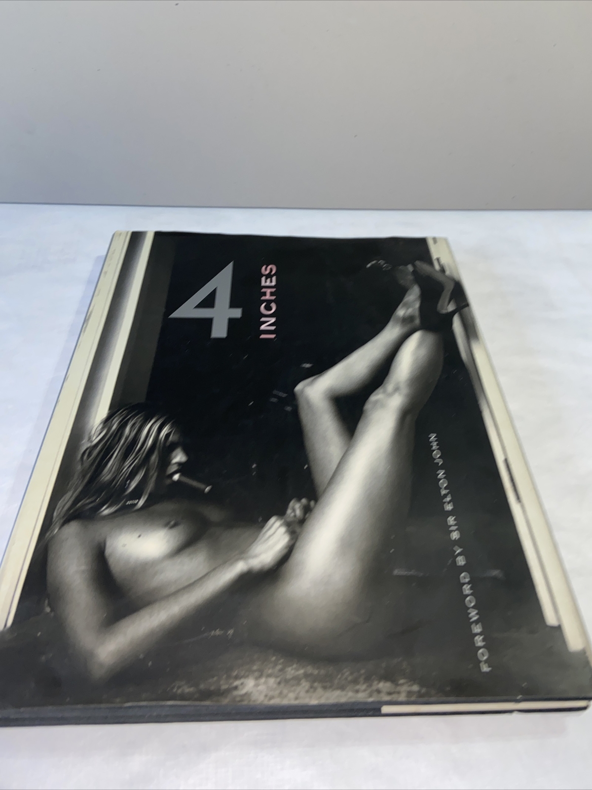 4 Inches Foreword by Sir Elton John