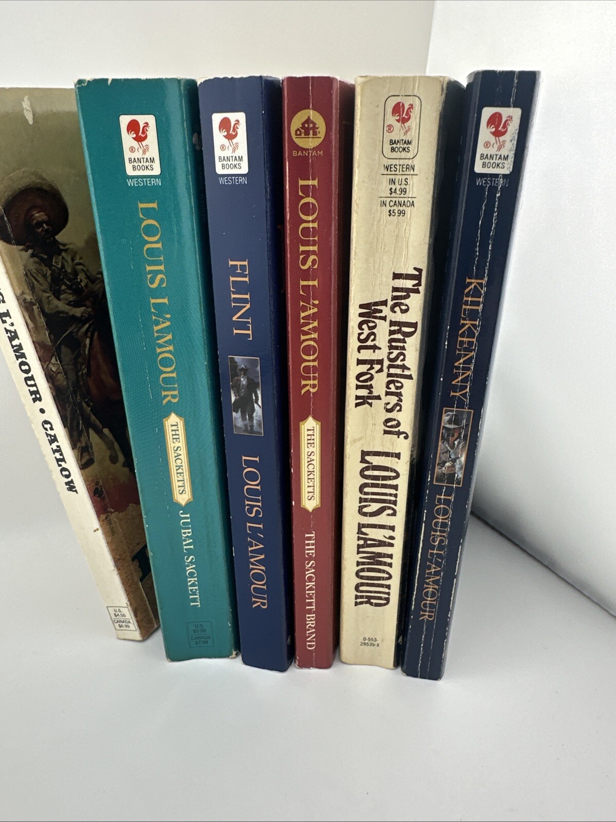Lot of 6- LOUIS L’AMOUR – Paperback Western Books – Mixed Titles