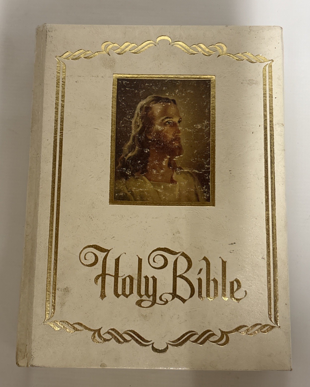 vintage large white-and-gold Family Bible, King James Version