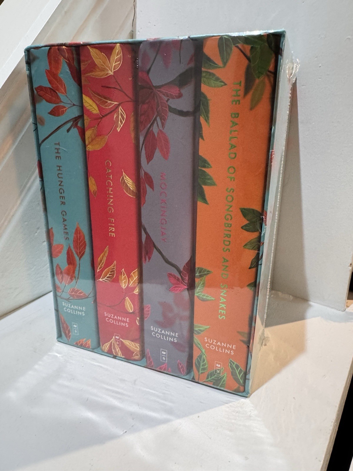 RARE- HARDCOVER The Hunger Games Deluxe UK Collection by Suzanne Collins