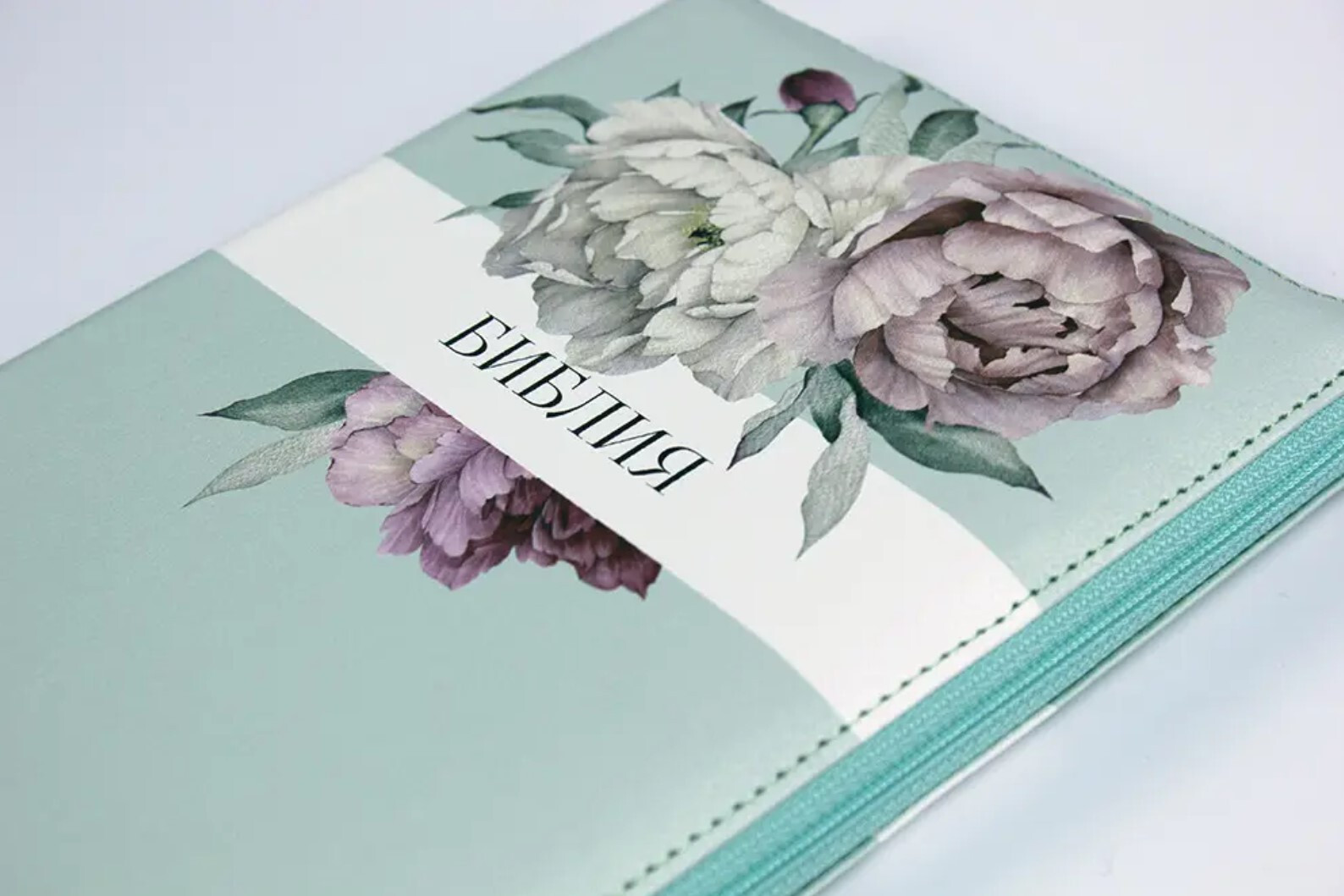 Bible with a lock. Desing Peonies, floral print on the cut pages. Greate Gift