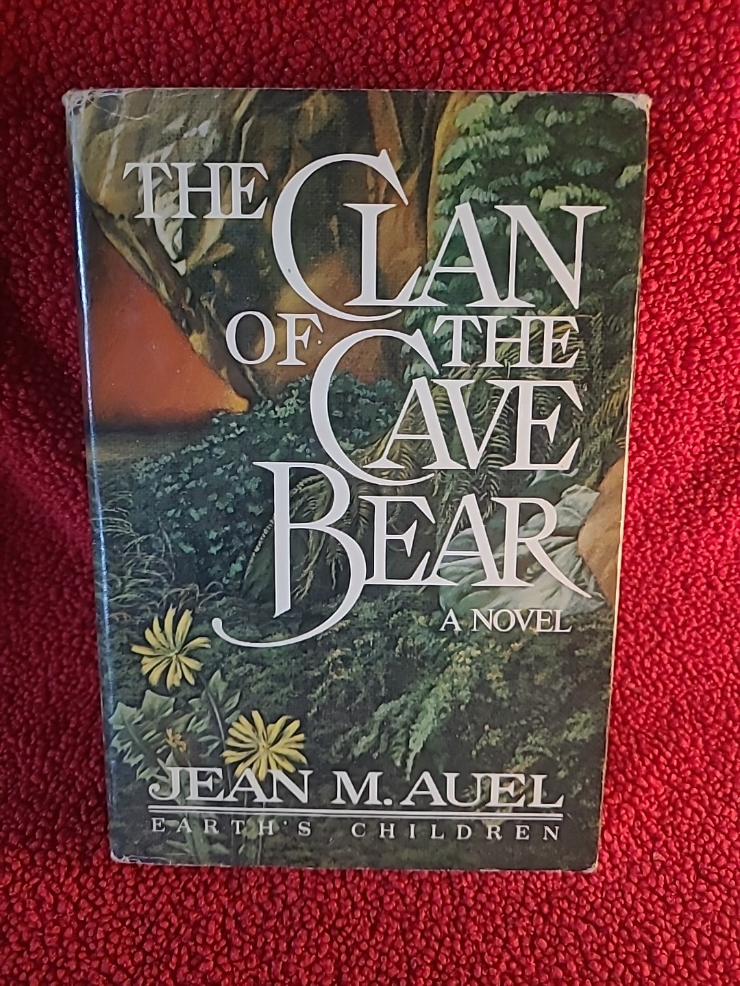 Hardcover first edition of the novel The Clan of the Cave Bear by Jean M. Auel.