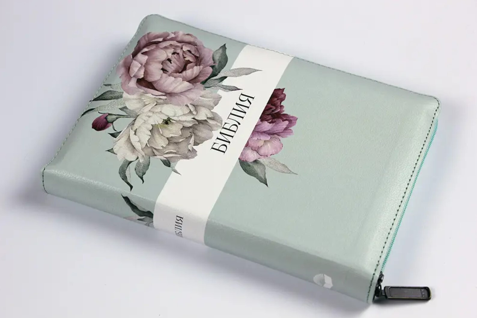 Bible with a lock. Desing Peonies, floral print on the cut pages. Greate Gift