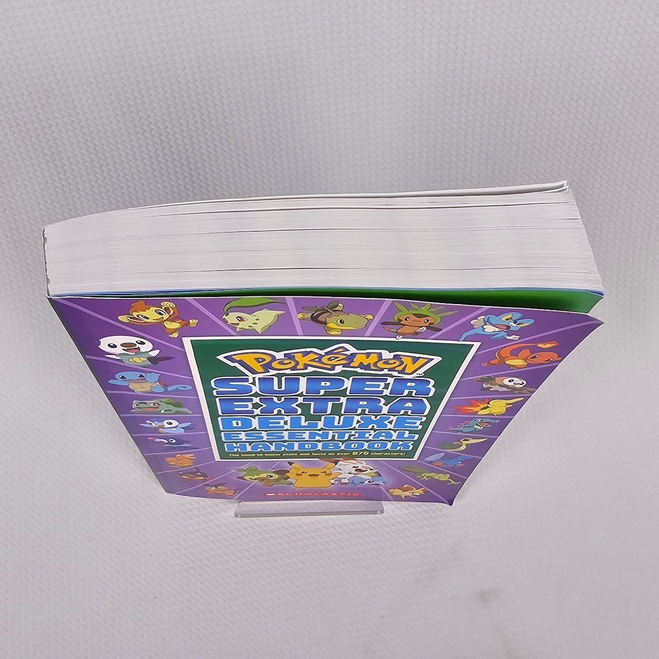 Pokémon Super Extra Deluxe Essential Handbook Schoolastic Paperback