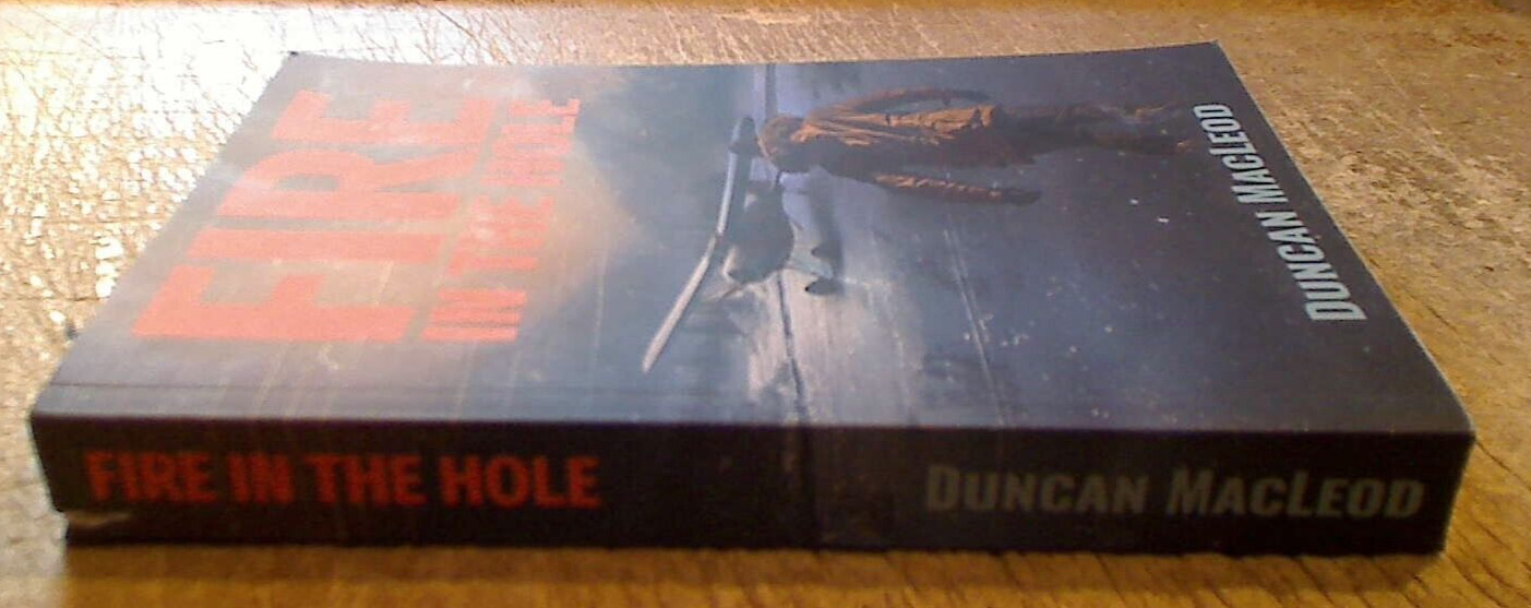 LIKE NEW – Fire in the Hole by Duncan MacLeod – Paperback, 340 pages