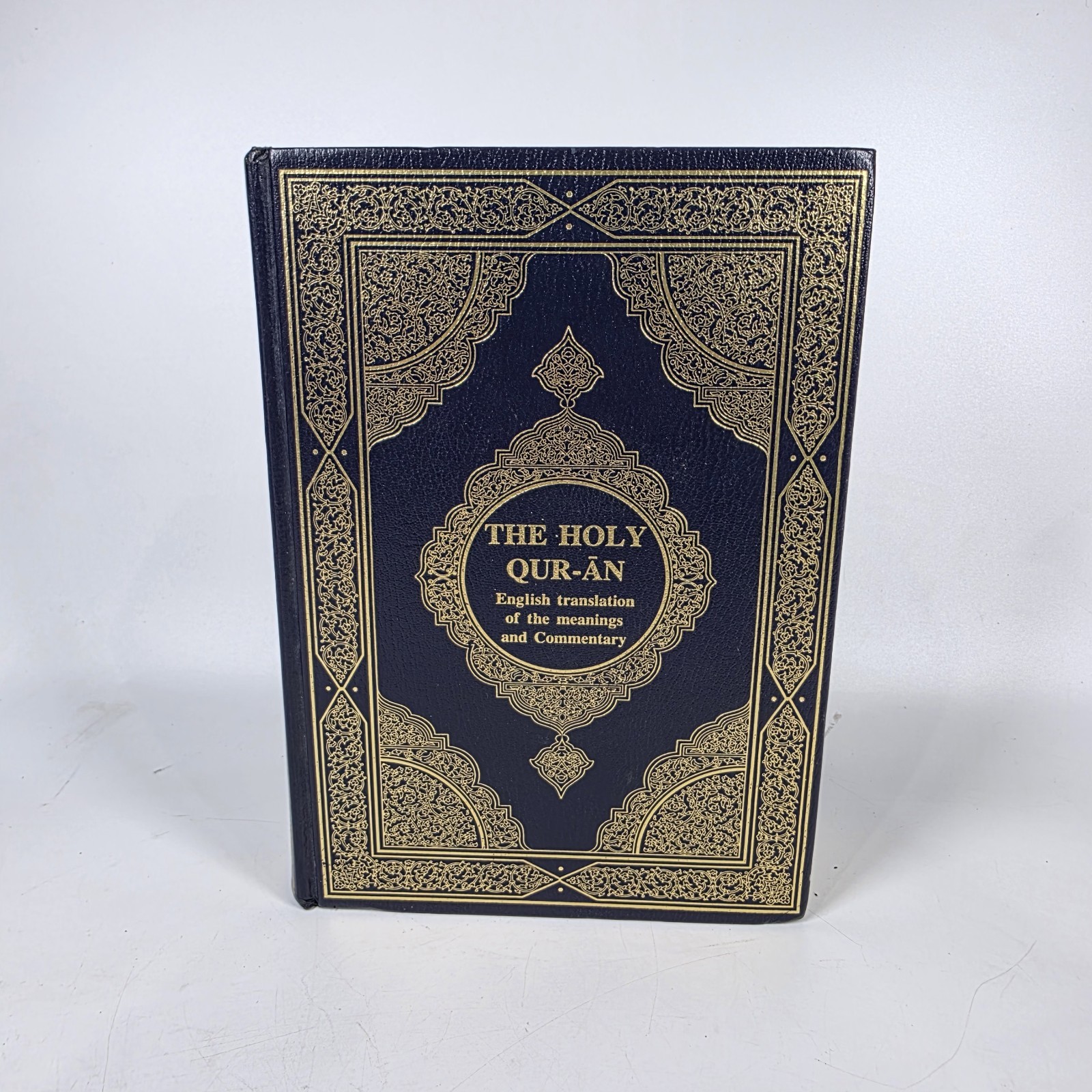 The Holy Qur-an: English Translation of the Meanings and the Commentary, Quran