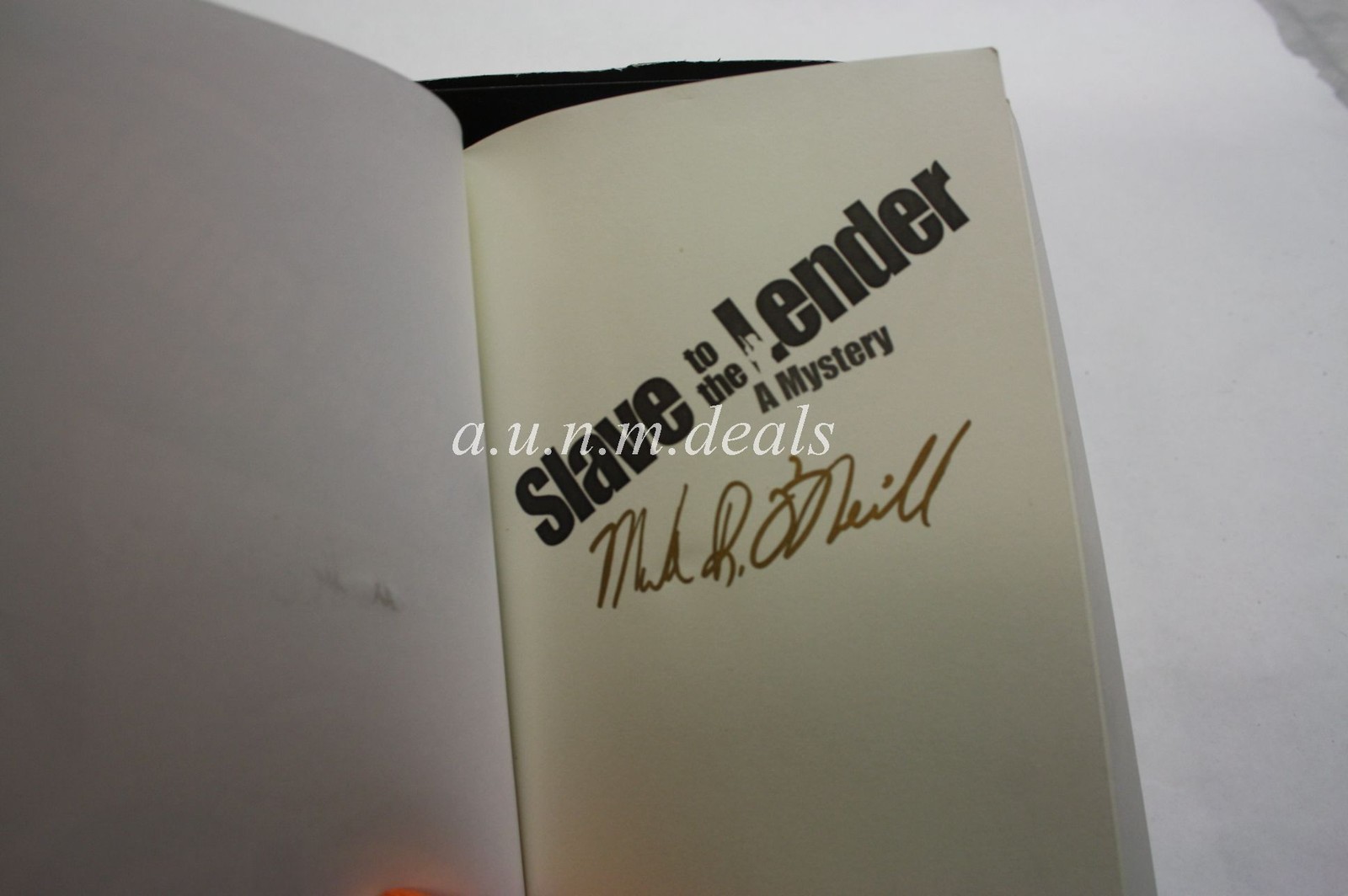 (Signed) Mark R. O’Neill , Slave to the Lender: A Mystery