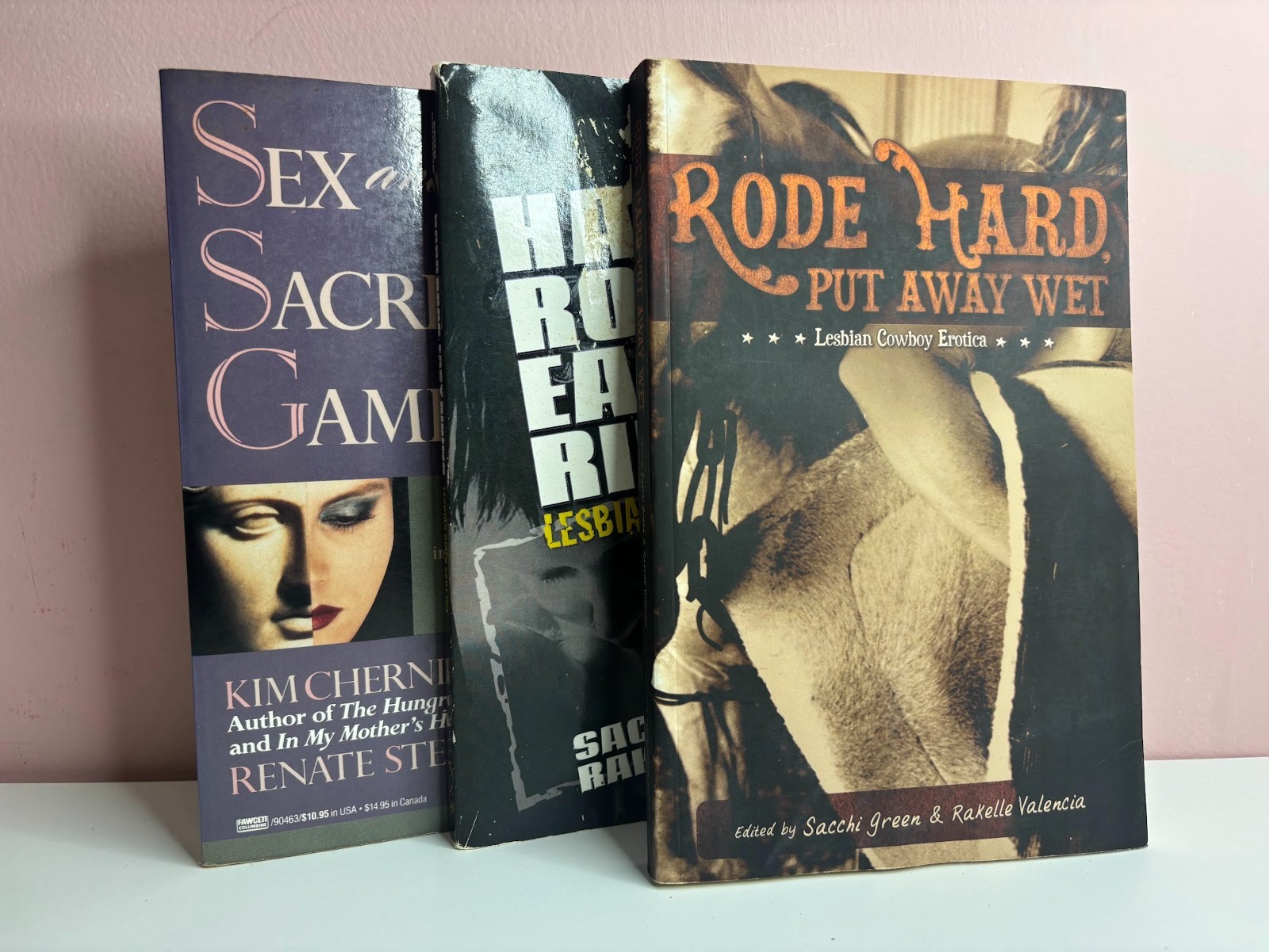 3 LGBTQIA+ books: lesbian erotic fiction (1990s-2000s), cowboy, biker