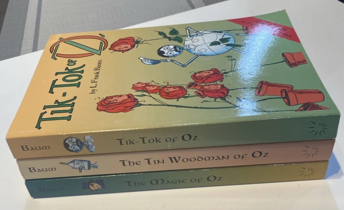 Lot of 3 L. Frank Baum Wizard of Oz paperback books. Very Good Condition