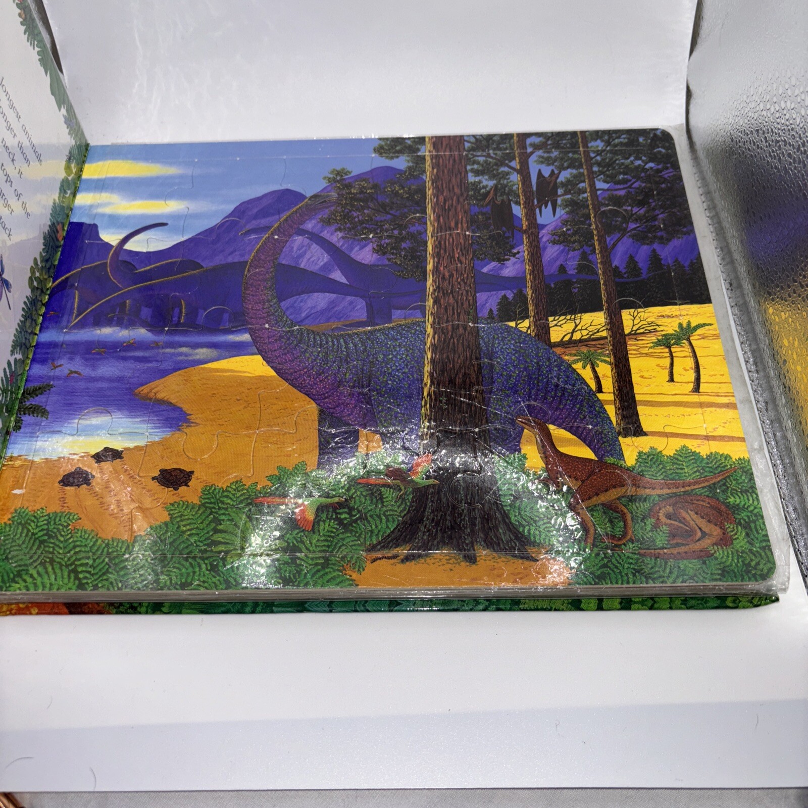 Jigsaw Dinosaurs by Anne Sharp. (2000, Hardcover) jigsaw puzzles in a book form