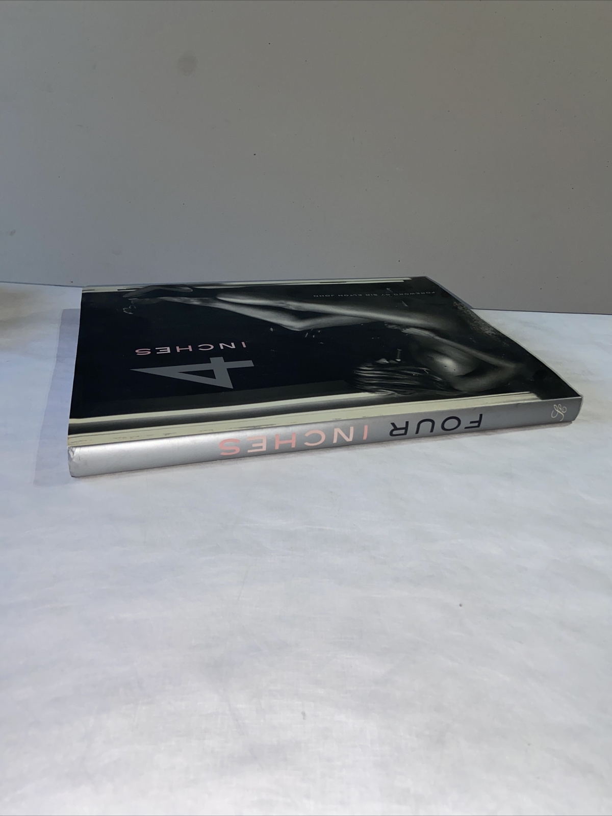 4 Inches Foreword by Sir Elton John