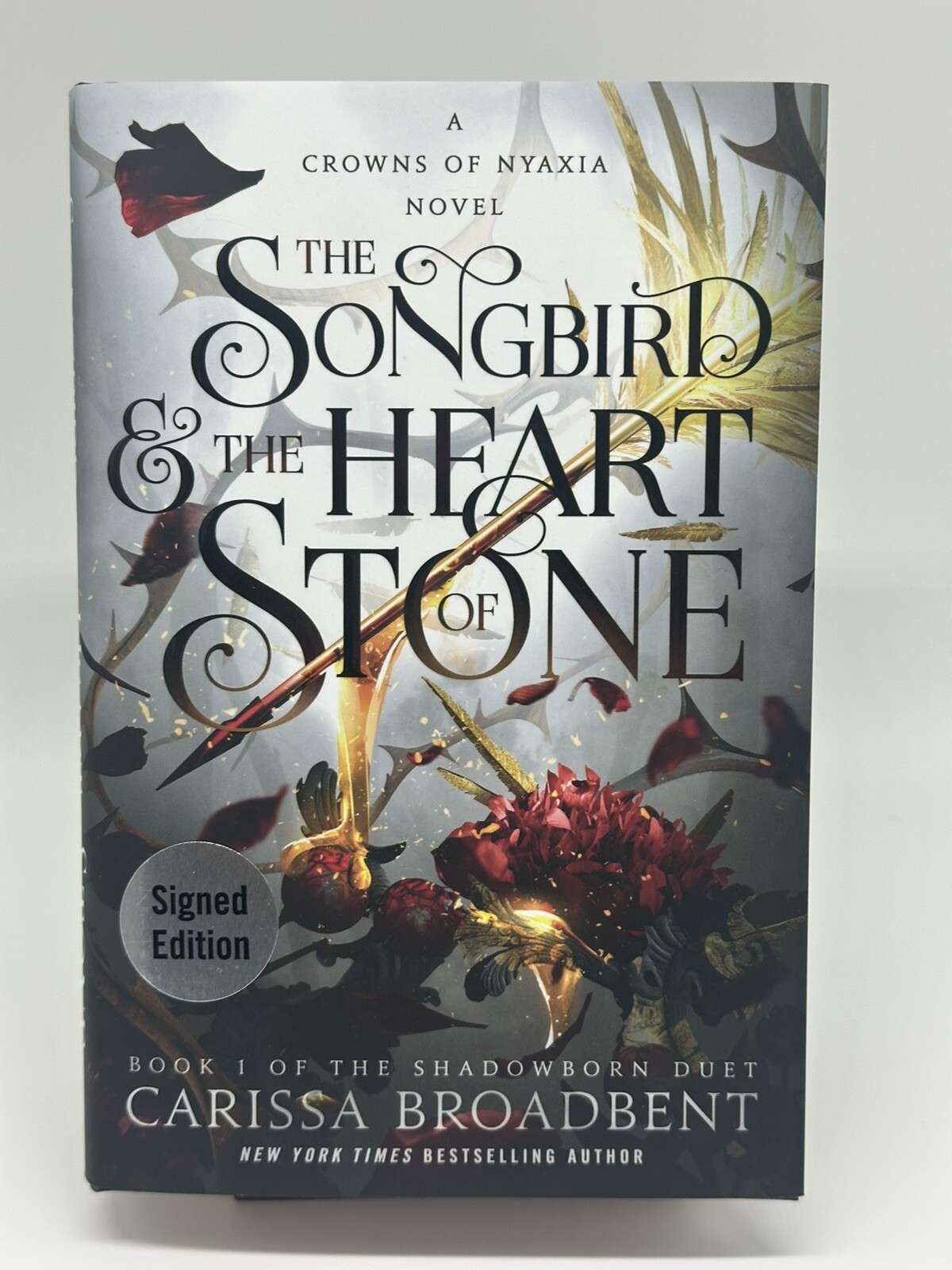 Signed – The Songbird And The Heart of Stone by Carissa Broadbent 1st/1st
