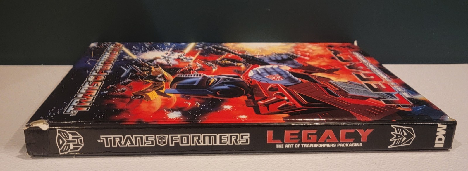 Transformers Legacy Book: The Art of Transformers Packaging + Visual Guide Book