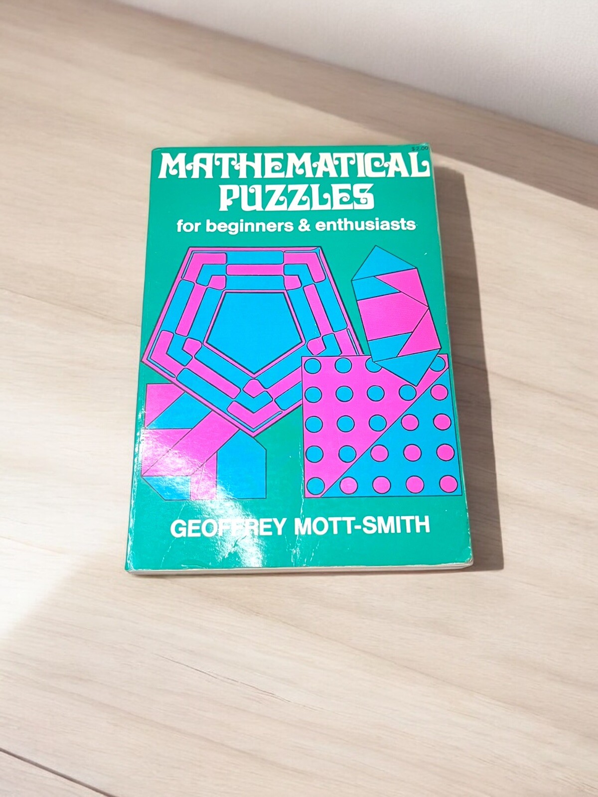 Mathematical Puzzles for Beginners & Enthusiasts by Geoffrey Mott-Smith – Dover