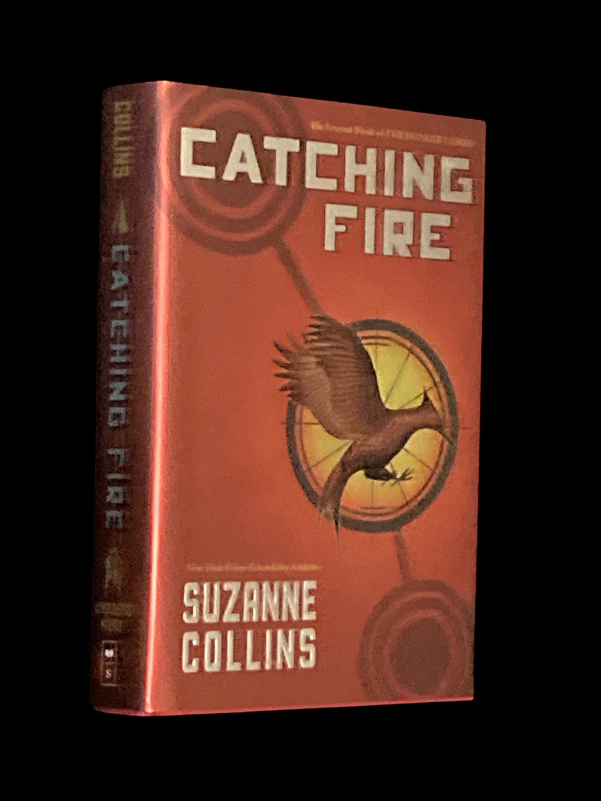 Book: CATCHING FIRE by Suzanne Collins HUNGER GAMES Book 2 HCDJ New