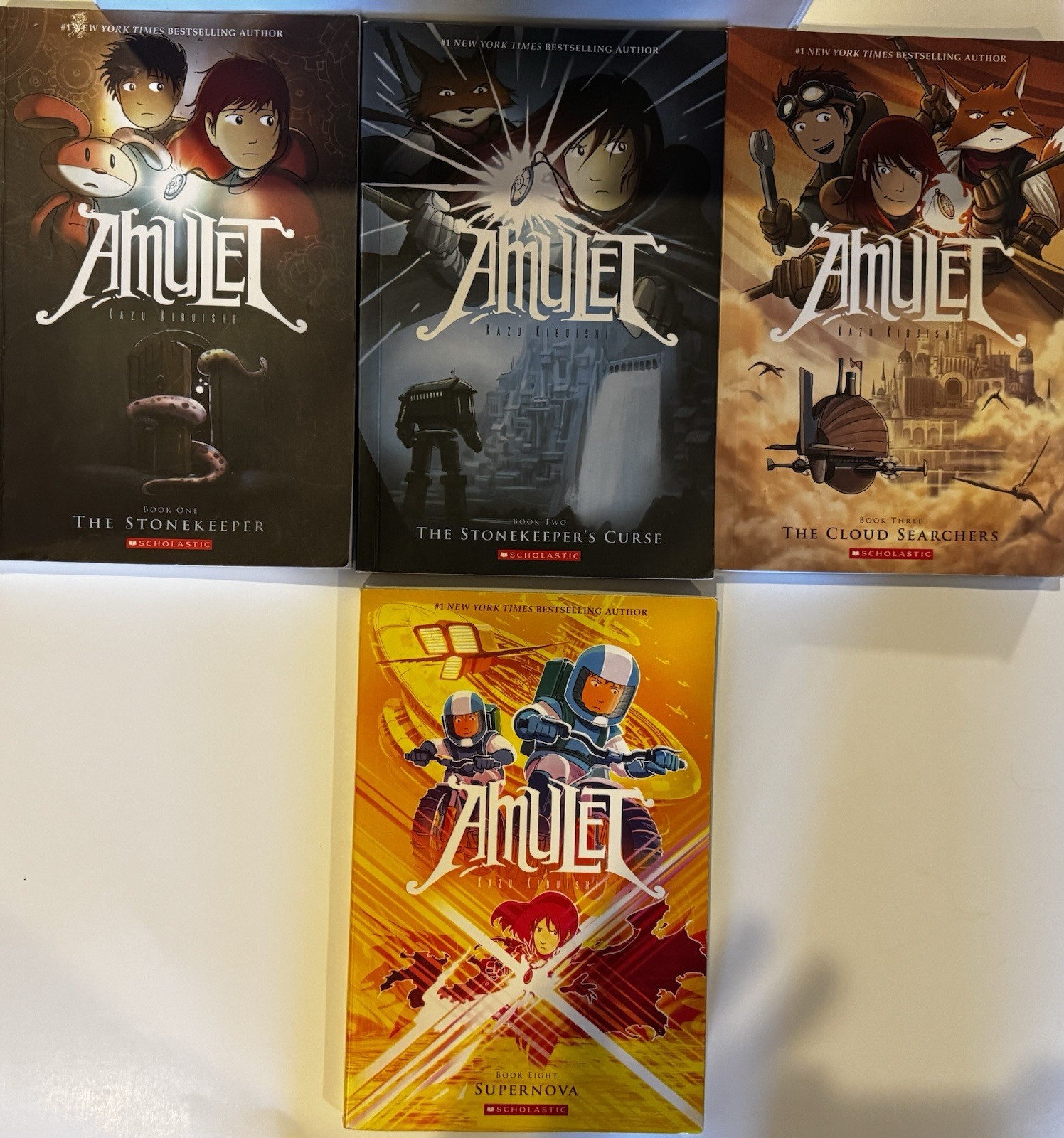 Lot of 4 AMULET Series by Kazu Kibuishi Books Graphic Novels 1 -3 & 8 (PB)