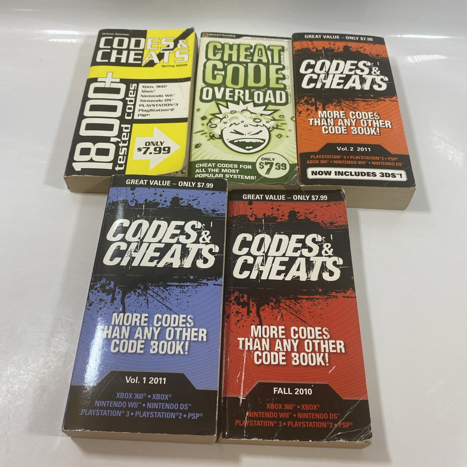 (5) Pack Of Video Game Cheat Code Books Consoles And Handhelds.