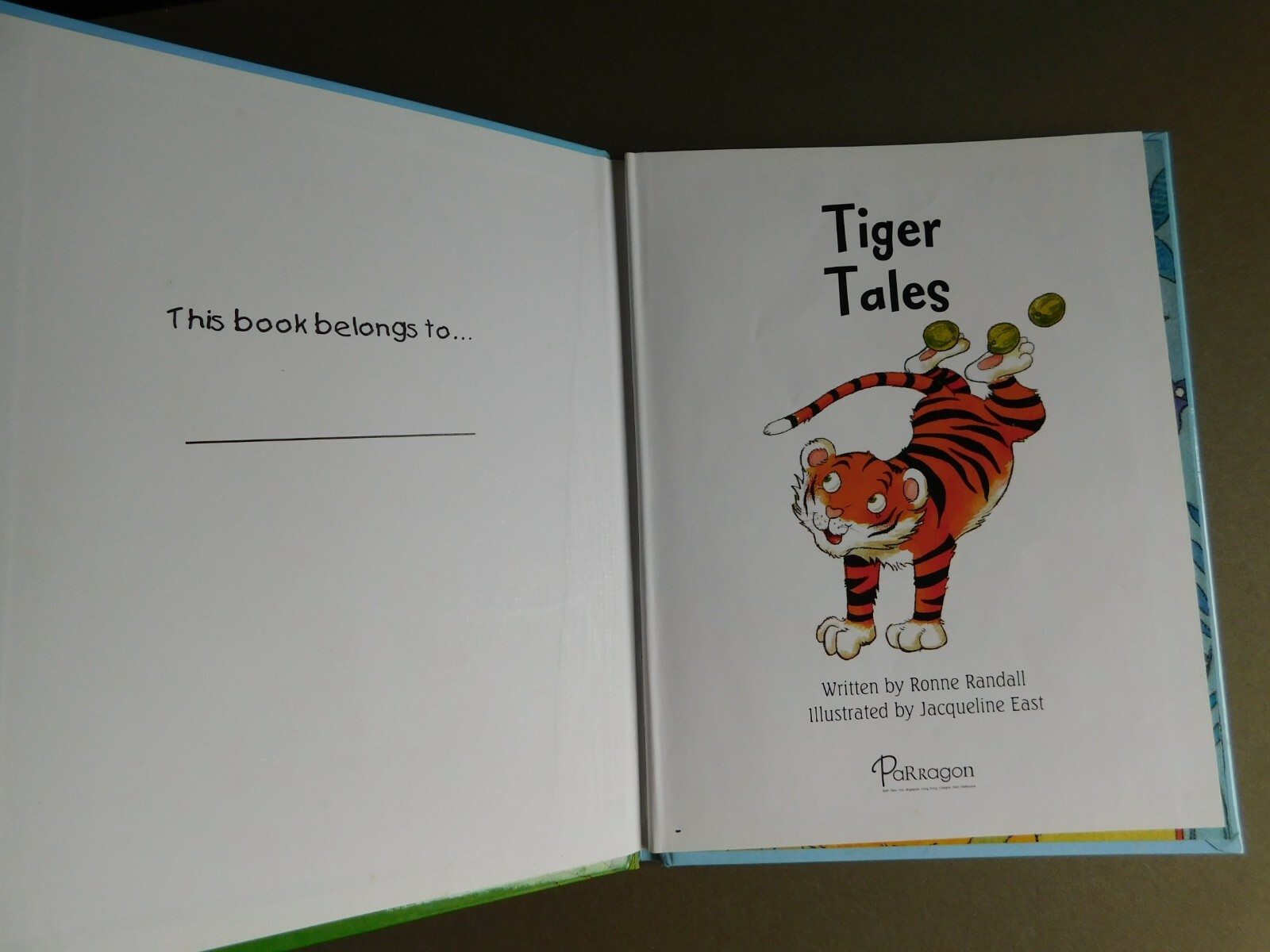 Tiger Tales – by Ronne Randall – – 2008 Parragon Children’s book