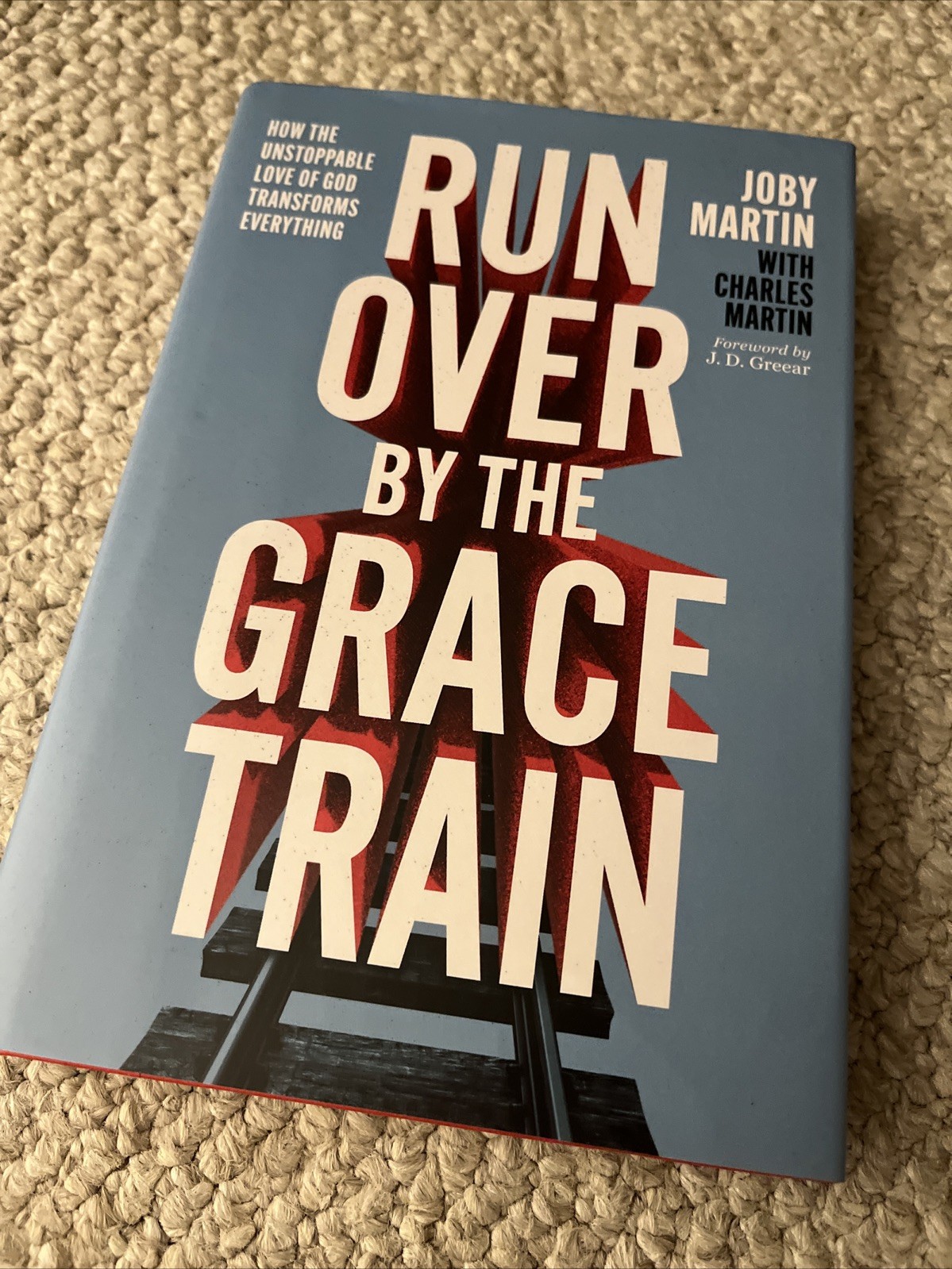 Run Over By the Grace Train: How the Unstoppable Love of God..Hardcover