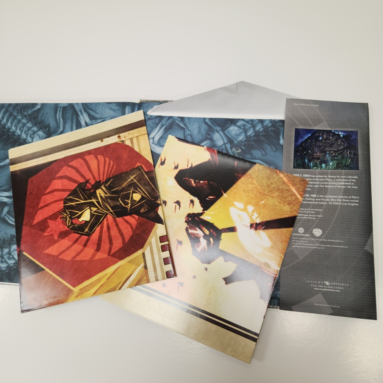 Pacific Rim: Man, Machines and Monsters by David S. Cohen contains stickers