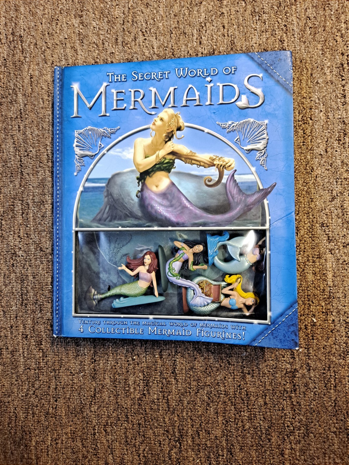 “THE SECRET WORLD OF MERMAIDS” BOOK & 4 COLLECTIBLE MERMAID FIGURINES