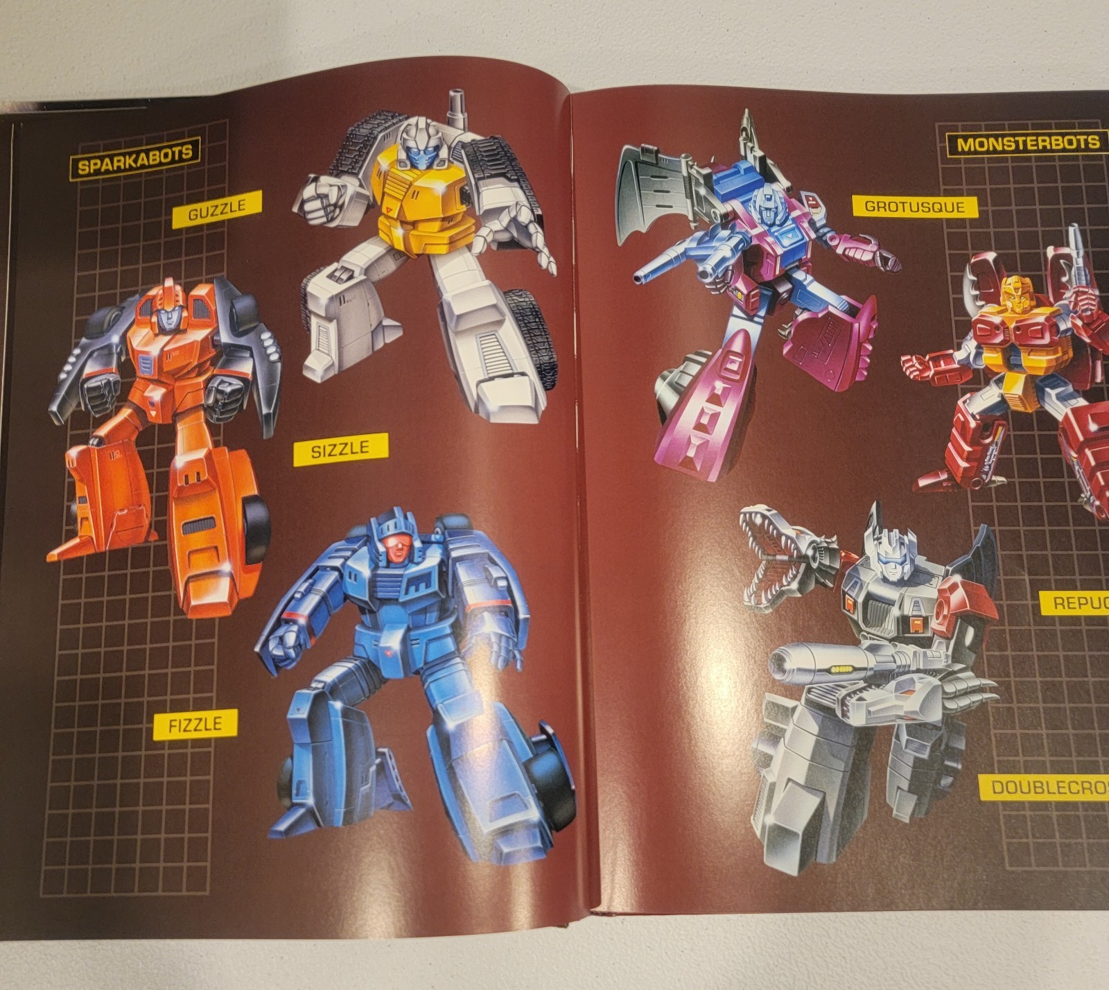 Transformers Legacy Book: The Art of Transformers Packaging + Visual Guide Book