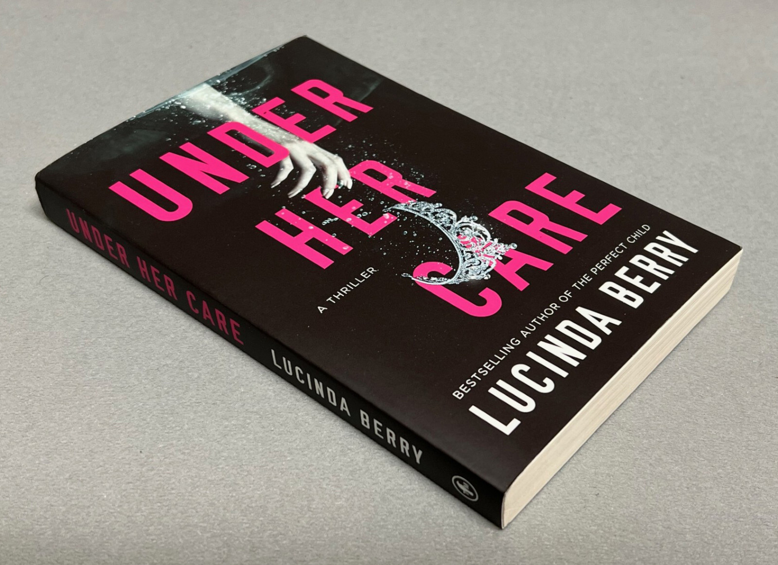 UNDER HER CARE: A Thriller (2022) PAPERBACK By Lucinda Berry