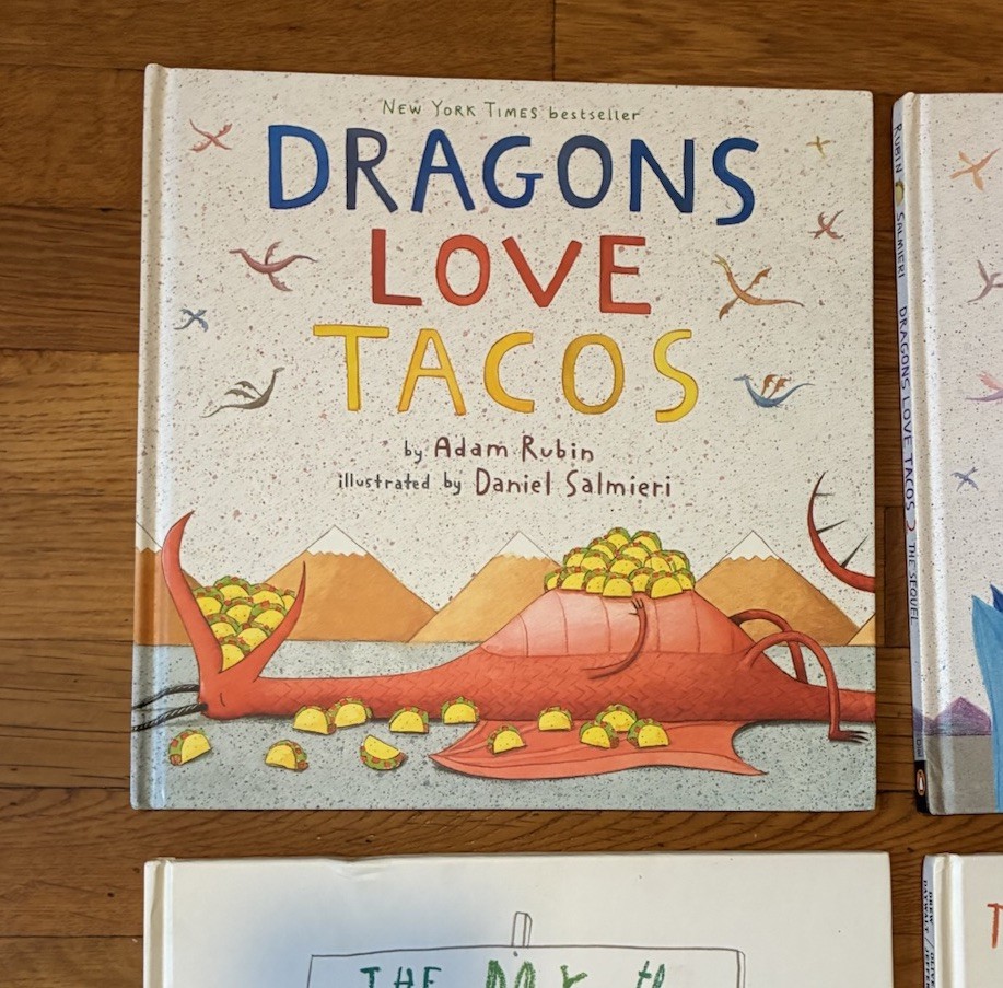 Lot of 4 Illustrated Children’s Books English Language Dragons Love Tacos etc.