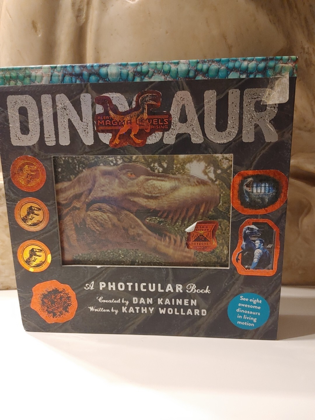Dinosaur: A Photicular Book by Wollard, Dinosaur Stickers On Cover Of Book.