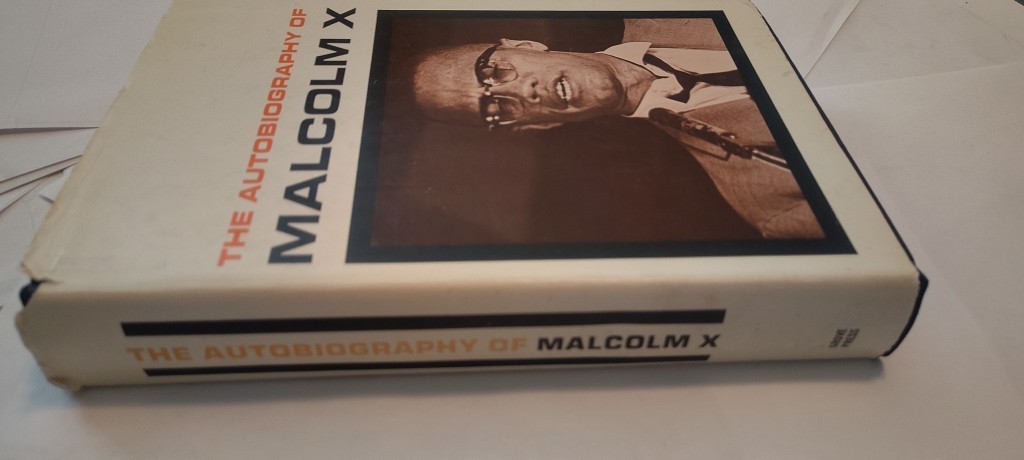 The Autobiography of Malcom X book 10th Printing 1965 grove press HC w/ DJ