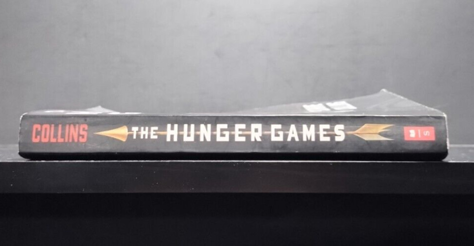 The Hunger Games – Suzanne Collins – 2010 Scholastic – Young Adult Fiction / Dys