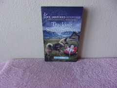 Alaska K-9 Unit Ser.: Tracking Stolen Secrets by Laura Scott (2021, Mass Market)