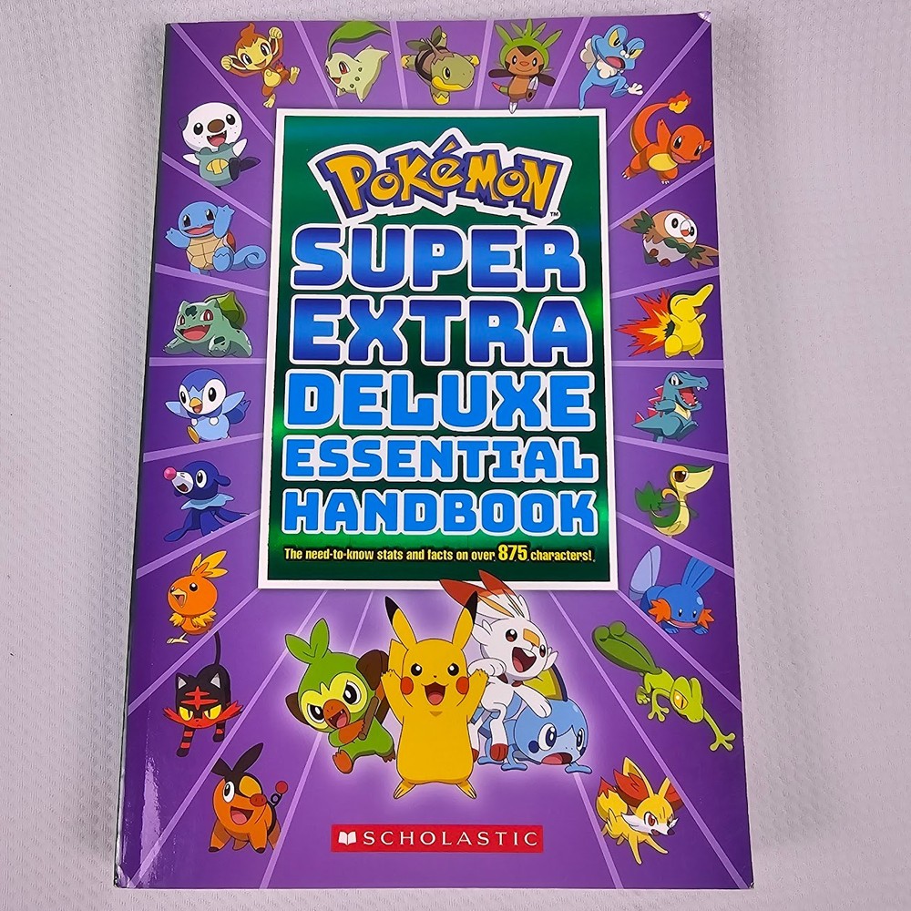 Pokémon Super Extra Deluxe Essential Handbook Schoolastic Paperback